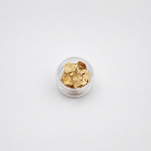 Load image into Gallery viewer, Small clear container with gold leaf pieces on a white background