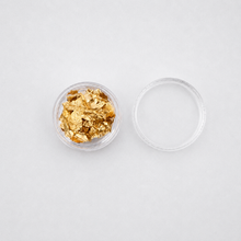 Load image into Gallery viewer, Small open clear container with gold leaf on a white background