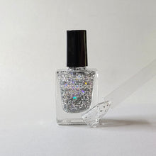 Load image into Gallery viewer, peelable water-based 'Bling' polish bottle with colored sample nail