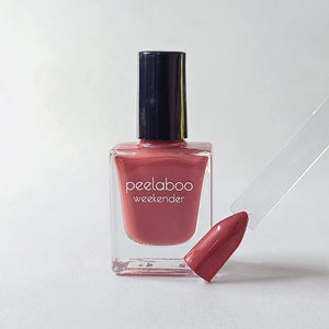 peelable water-based 'Rosy' polish bottle with colored sample nail