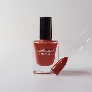 peelable water-based 'Autumn' polish bottle with colored sample nail