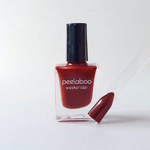 peelable water-based 'fiery' polish bottle with colored sample nail