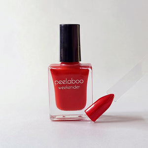 peelable water-based 'poppy' polish bottle with colored sample nail