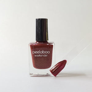 peelable water-based 'voltage' polish bottle with colored sample nail